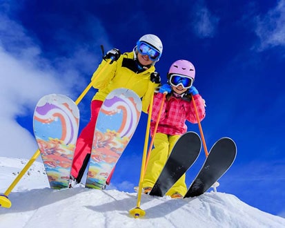 Skiers enjoying one of Poconos winter acitivites Skiing in Poconos, winter activities