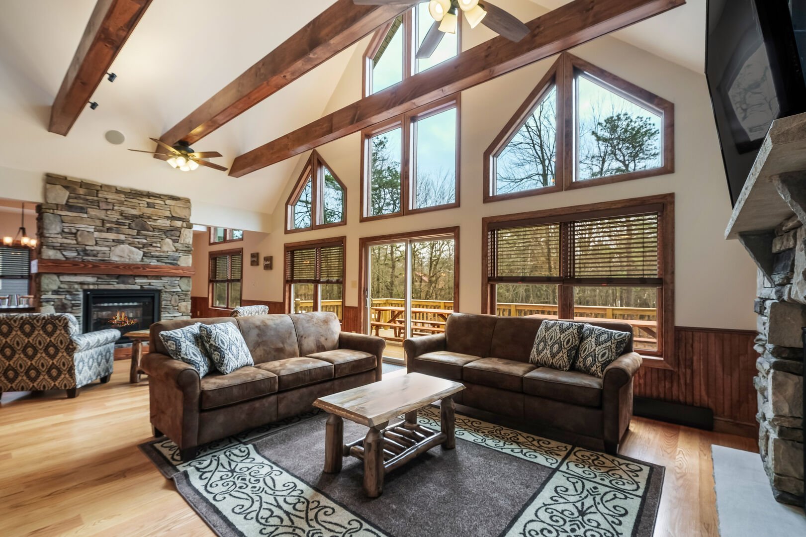 living room with vaulted ceilings