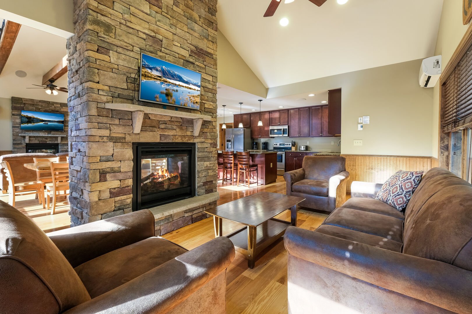 living room with two-sided fireplace