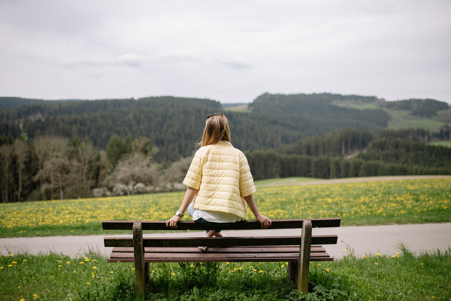 woman sitting on bench