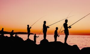 Group fishing is a popular activity during lakefront getaways at Lake Harmony.