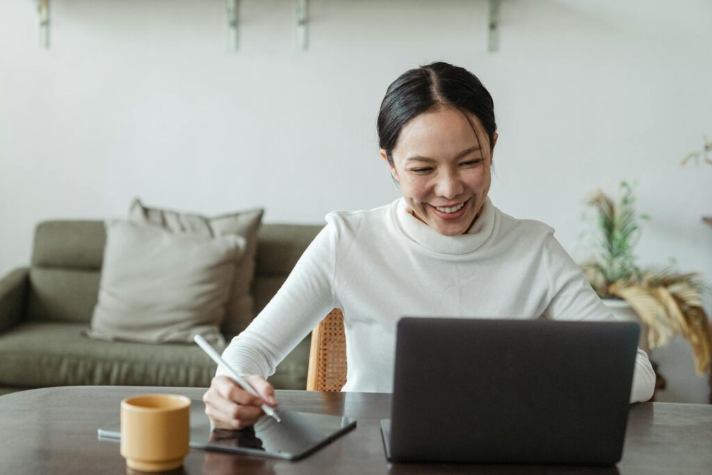 View of a person using a laptop